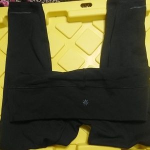 Athleta Black Tights with reflective details on th